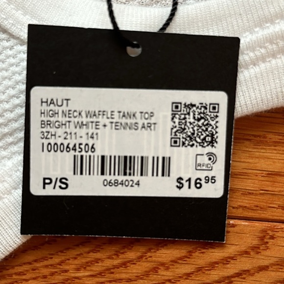 Small, white tank top. - Picture 2 of 2